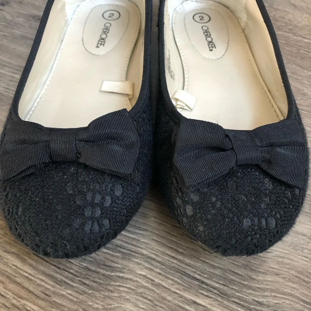 Black flats.